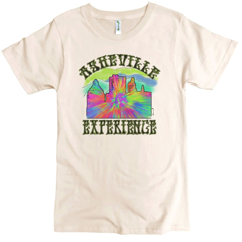 The Asheville Experience Graphic Tee by Spiritex | Sustainable Apparel is an organic cotton, cream crewneck with a psychedelic mountain and city graphic, accented by bold retro text above and below the image.