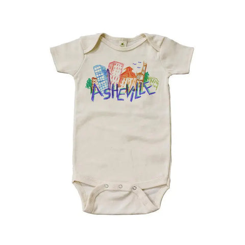 The Asheville Crayon Skyline Graphic Bodysuit by Spiritex | Sustainable Apparel is an off-white, organic cotton baby bodysuit featuring a hand-drawn city skyline and “Asheville” in bold letters, made with non-toxic dyes.