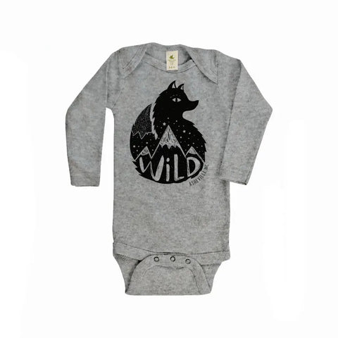 The Asheville Wild Fox Long Sleeve Graphic Bodysuit by Spiritex | Sustainable Apparel is made from organic cotton and features a black wild fox, mountain, and tree graphic with WILD in bold. Snap buttons at the bottom make for easy changes.