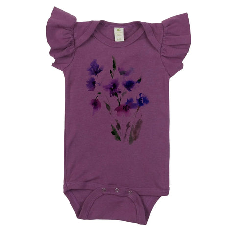 The Spiritex | Sustainable Apparel Graphic Ruffle Sleeve Snappies feature a watercolor floral design in dark purple and black. Made from organic cotton, this baby bodysuit is gentle on sensitive skin.