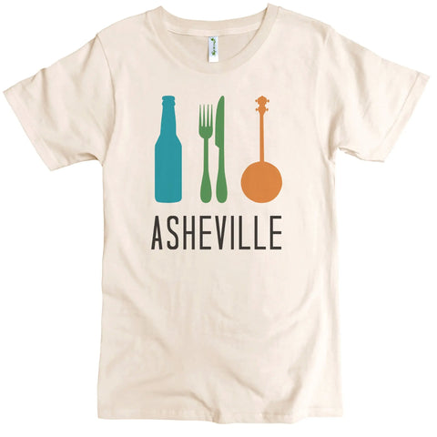 The Beer Food Banjo Graphic Tee by Spiritex | Sustainable Apparel features a cream crewneck in organic cotton, with blue bottle, green fork and knife, and orange banjo graphics above bold black ASHEVILLE text. Playful design!.