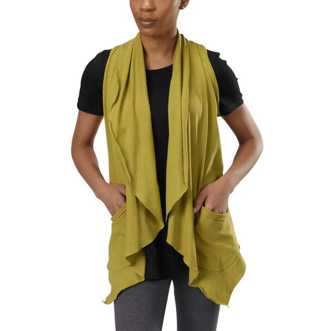 A person wears a black t-shirt, gray leggings, and the Spiritex | Sustainable Apparel Ultra Lightweight Draped Vest with pockets—an ideal layering piece—standing against a plain white background.