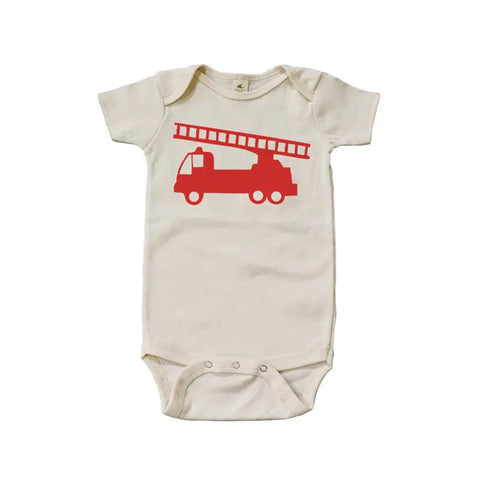 The Spiritex Firetruck Graphic Bodysuit is an organic cotton, cream-colored onesie with a bold red firetruck and ladder on the front. Perfect for sensitive skin, it features short sleeves and bottom snaps.