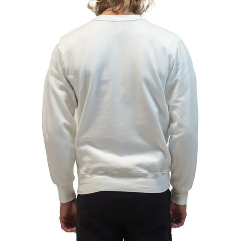 A person with long blond hair is facing away from the camera, wearing the Spiritex | Sustainable Apparel Fleece Crewneck Sweatshirt in plain white organic cotton and dark pants, set against a white background.