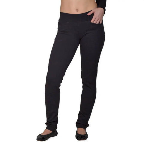 A person wearing Spiritex | Sustainable Apparel’s Fleece Saratoga Pants stands against a white background in black flats, with the upper body cropped out of the frame.