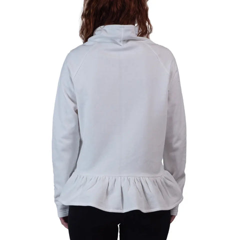 A person with wavy brown hair is shown from the back wearing the Charlotte Street Sweatshirt by Spiritex | Sustainable Apparel, featuring a peplum hem and long sleeves. The background is plain white.