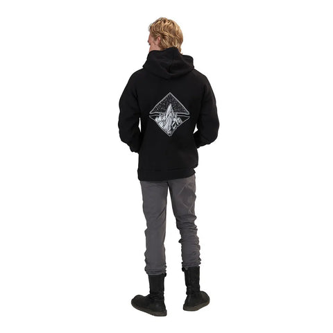 A person with blonde hair wears the Spiritex Graphic Heavyweight Fleece Hoodie | Mountain Scape, featuring a white geometric mountain design on the back, paired with gray pants and black boots, standing against a white background.