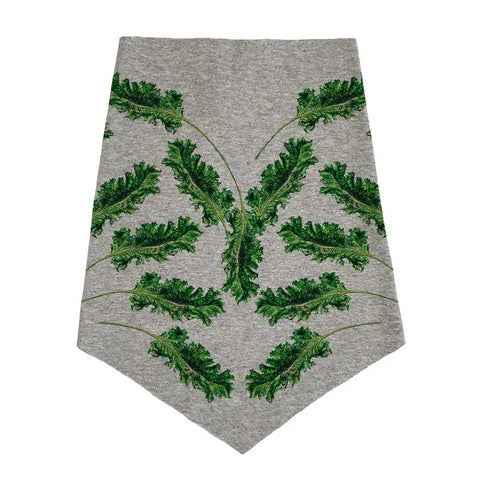 The Infinity Bandana by Spiritex | Sustainable Apparel features a gray, pointed design with symmetrical green kale leaf patterns, inspired by eco-friendly bandanas and organic cotton styles for a fresh, natural look.