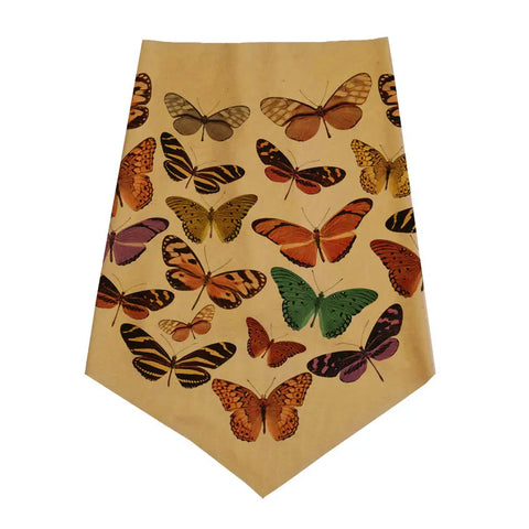 The Infinity Bandana by Spiritex | Sustainable Apparel features a beige pennant-shaped design with vibrant butterflies in flight, crafted from organic cotton bandana material for an eco-friendly touch.