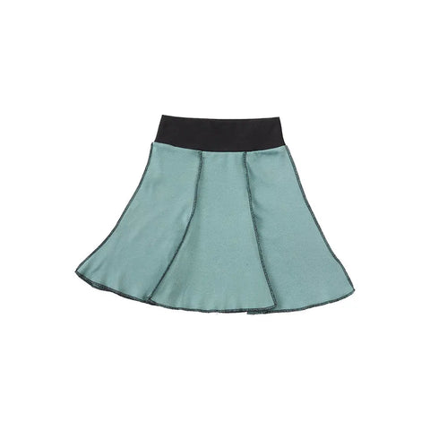 The Short Seamed Flare Skirt by Spiritex | Sustainable Apparel is a light blue, 100% organic cotton skirt featuring visible black stitching and a wide black waistband, shown against a white background.