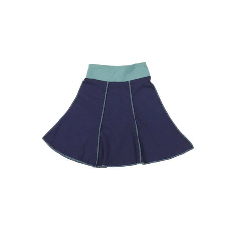 The Spiritex Short Seamed Flare Skirt is a dark blue, 100% organic cotton skirt with vertical light blue stitching and waistband, grown and sewn in the USA. Displayed on a white background.