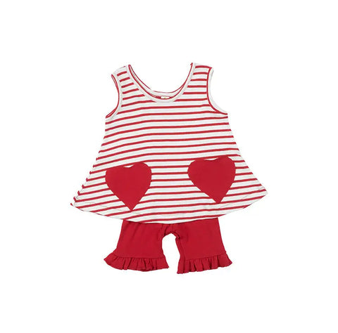 The Spiritex Striped Heart Pocket Tunic Tank in red and white Sailor Stripe features two heart-shaped pockets and comes with matching red ruffled shorts for a sweet nautical style.