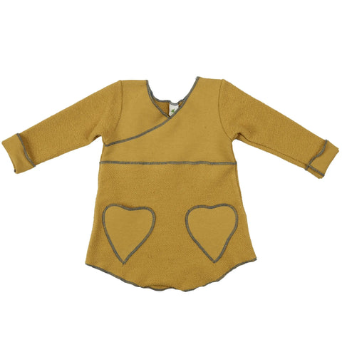 The Spiritex Heavy Terry Heart Pocket Tunic Sweatshirt is a kids’ long-sleeve, mustard yellow top with dark grey seams and two heart-shaped front pockets.
