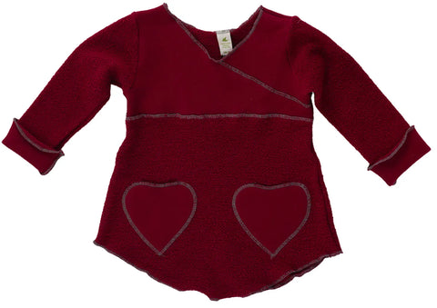 The Spiritex Heavy Terry Heart Pocket Tunic Sweatshirt is a kids long-sleeved, dark red terry tunic with heart-shaped pockets, grey trim on edges and cuffs, plus an asymmetrical neckline and hem for a stylish look.