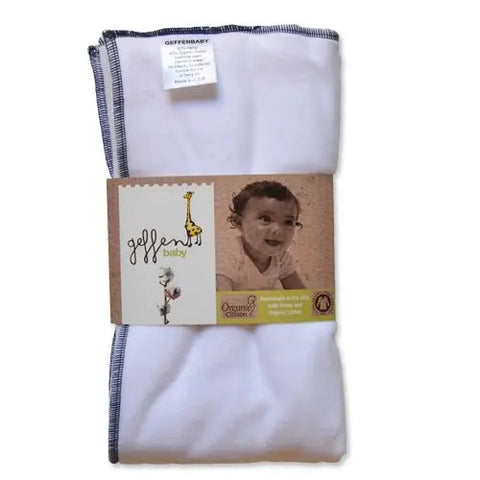 A folded white Geffenbaby Cloth Prefold Diaper | Super Absorbent Fleece Hemp | Organic Cotton, with dark stitched edges, is wrapped in brown packaging displaying a baby photo, giraffe illustration, and organic cotton labeling.