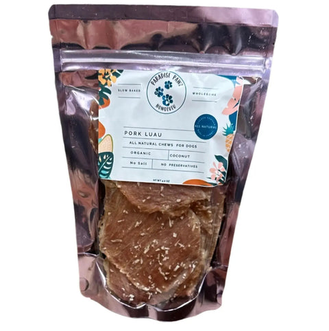 Dogtown Bakerys Pork Luau jerky chews for dogs come in a clear resealable bag, featuring organic and coconut ingredients with no salt or preservatives. This tropical snack is easily seen through the packaging.