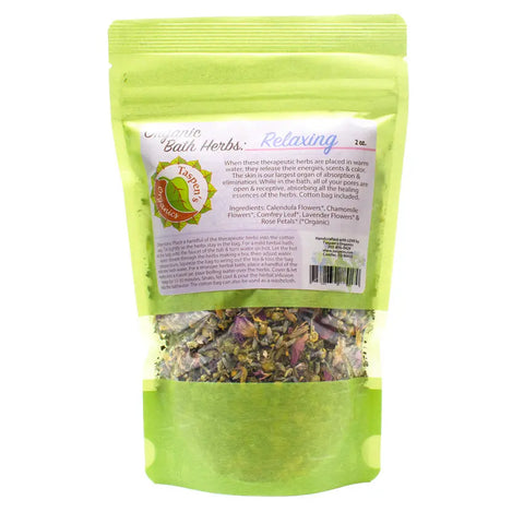 Taspens Organics Relaxing Bath Herbs come in a green resealable pouch with a clear window showing the herbal blend. Ingredients and usage instructions are printed on the packaging for natural wellness.