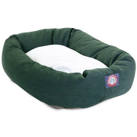 The Majestic Pet Poly/Cotton Sherpa Bagel Dog Bed is rectangular and green, with high cushioned sides, a soft white Sherpa inner area, water-resistant material, and a red-and-white paw print logo in one corner for easy cleaning.