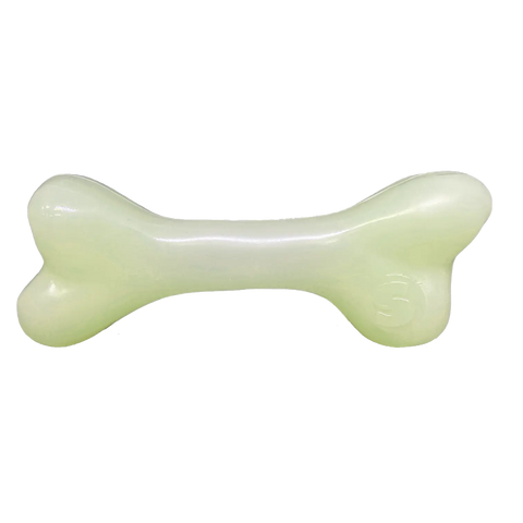 The SodaPup PUP-X Synthetic Rubber Chewing & Floating Bone Toy is a light green, glow-in-the-dark, bone-shaped dog toy with a smooth surface, shown isolated on a white background.