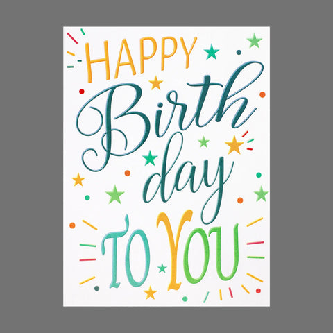 The JuLu Cards Pack of 4 HAPPY Birthday to YOU (20067) features vibrant birthday cards with colorful stars and bursts on a white background with gray borders.