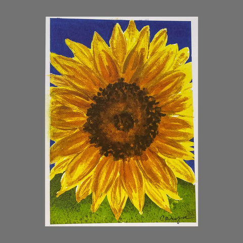 Pack of 4 JuLu Cards - Large Sunflower (20046): Watercolor of a bright yellow sunflower with a brown center, blue sky, and green ground. Carelyn signature on 4.5 x 6.25 cards with envelopes, ideal for greeting cards.