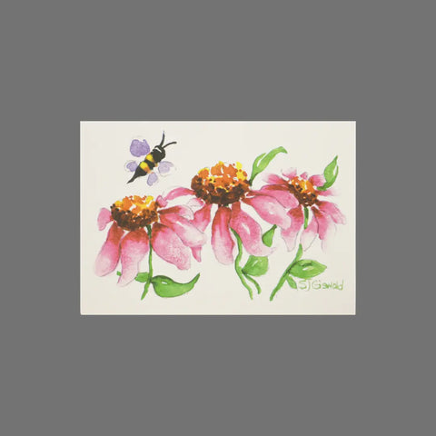 JuLu Cards’ Pack of 8 - Bee Above Three Flowers (10028) features watercolor pink flowers, green leaves, and a black and yellow bee on white, perfect for greeting cards. Includes envelopes.