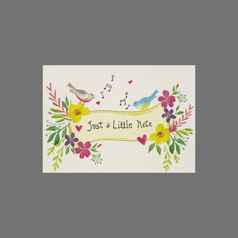 The JuLu Cards Pack of 8 Just a Little Note (10065) features 3.5 x 5 cards with colorful flowers, two birds, and musical notes, making them perfect for card packs or as individual cards with envelopes.