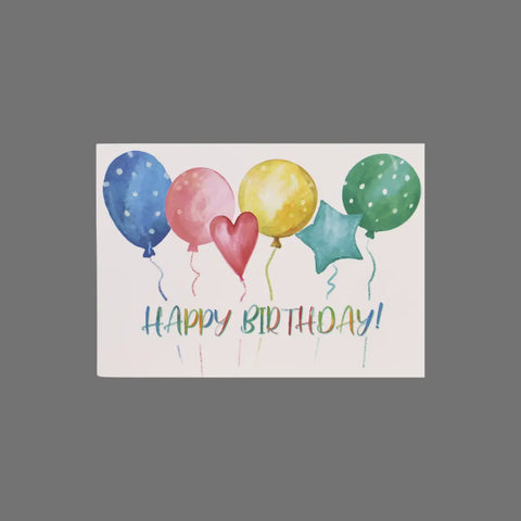 The JuLu Cards Pack of 8 features Happy Birthday! cards (10057) with colorful polka-dot, heart, and star balloons on a grey background. Sized 3.5 x 5 inches, each card comes with an envelope.