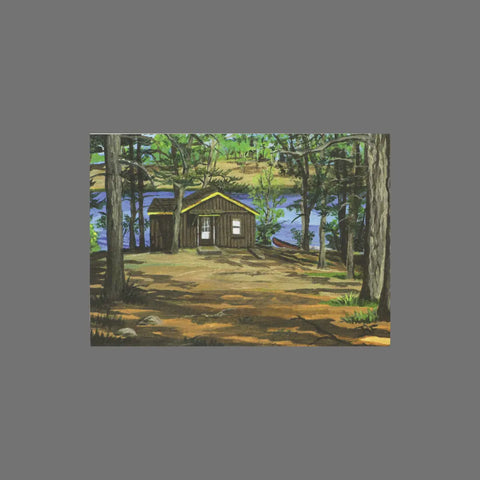 JuLu Cards Pack of 8 – Cabin Near Water With Trees and Canoe (10043) features a peaceful wooden cabin by a calm lake, surrounded by trees with a canoe nearby—ideal for giving your greeting cards a touch of nature.