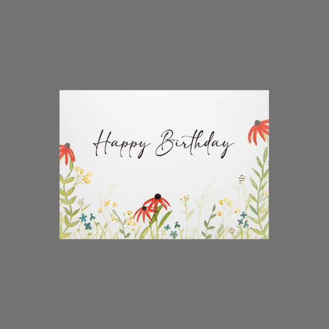 JuLu Cards Pack of 8 Happy Birthday With Wildflowers (10110) features blank birthday cards with elegant script and wildflower illustrations along the bottom and sides, set against a soft gray background.