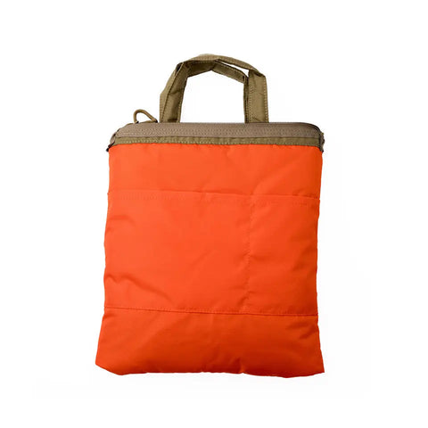 The MIS Padded F Helmet Bag S in coyote tan is a square packcloth nylon tote with tan handles and zipper, featuring a padded main compartment, shown against a plain white background.