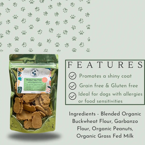 Dogtown Bakery Peanut Butter treats, made with natural ingredients, sit on a pale background with paw prints. Highlights: promotes a shiny coat, grain and gluten free, allergy friendly.