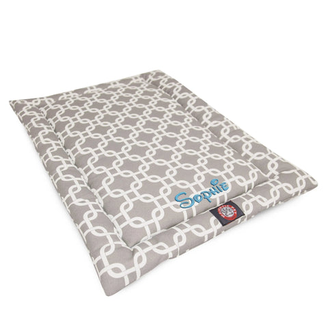 The Majestic Pet Links Crate Mat - Personalized is a rectangular, cushioned polyester dog bed with a gray and white chain-link pattern and Sophie embroidered in blue on one edge.