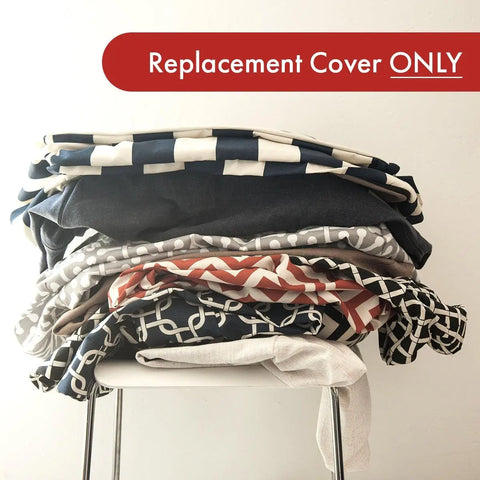 A stack of Anderson Check Sherpa Bagel Bed - Personalized covers by Majestic Pet sits on a chair, with a red banner reading Replacement Cover ONLY—ideal for updating your dog’s bed or providing extra support.
