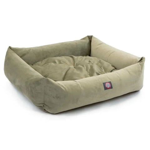 The Majestic Pet Suede Luxe Bagel Bed - Personalized features a square, olive-green design with raised cushioned sides, a plush fiberfill padded center, and a small sewn label on one side.