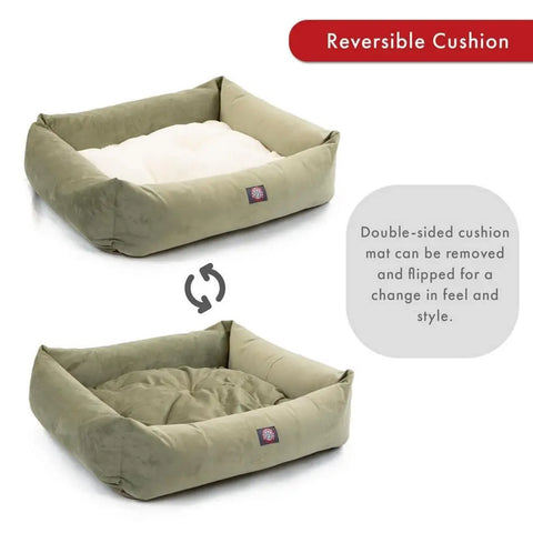 The Majestic Pet Suede Luxe Bagel Bed – Personalized is a green rectangular dog bed with a removable, reversible cushion—plush white on one side, smooth green on the other. Easily flip for comfort and style. Machine washable slipcover for easy cleaning.