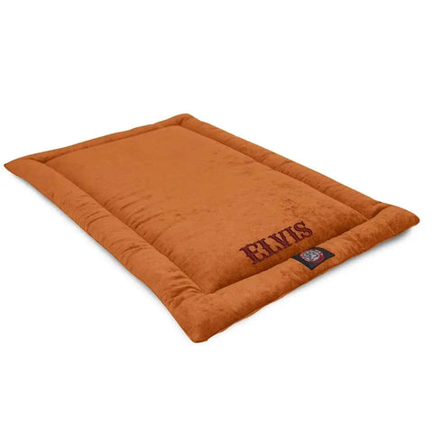 The Villa Crate Mat - Personalized by Majestic Pet is a rectangular, rust-colored polyester dog crate mat with BARKS embroidered in one corner and a small brand tag beneath, displayed on a white background.