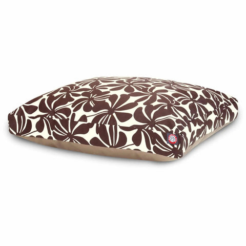 The Majestic Pet Plantation Rectangle Dog Bed features a cream background with a bold brown floral design and premium polyester fill for comfort. It rests on a plain white surface, with a small round tag on one corner.