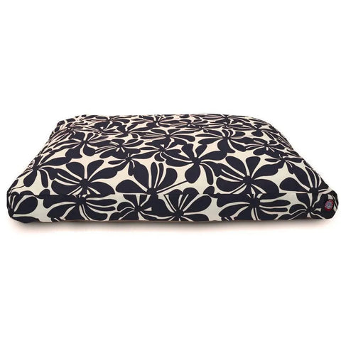 The Majestic Pet Plantation Memory Foam Dog Bed is a rectangular cushion with a white background and bold black floral pattern, featuring a removable cover for easy cleaning.