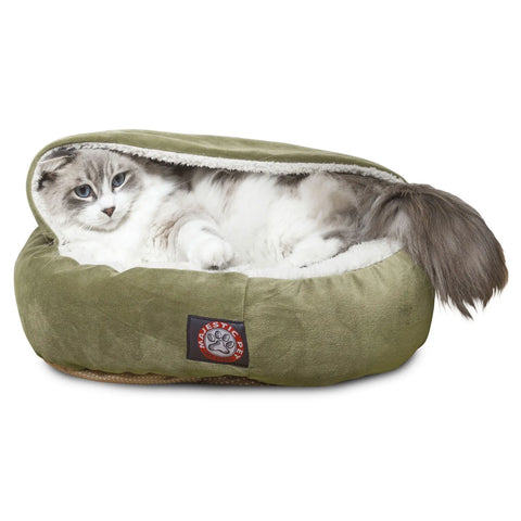 A fluffy white and gray cat lounges in the Majestic Pet Suede Canopy Cat Bed, featuring green plush faux suede, a soft inner lining, and a paw print logo on the front.