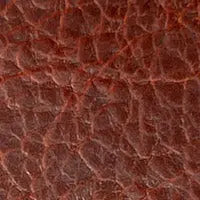 Close-up of a textured brown Rogue Industries Leather Checkbook Cover, featuring visible creases and natural leather patterns.