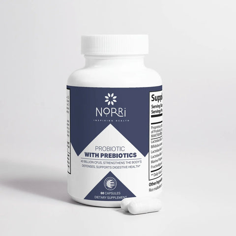A white Norri Nutrition Probiotic 40 Billion CFUs With Prebiotics bottle rests on a white surface with two capsules beside it. The label highlights 40 billion CFUs for digestive health, and supplement facts are visible on the side.