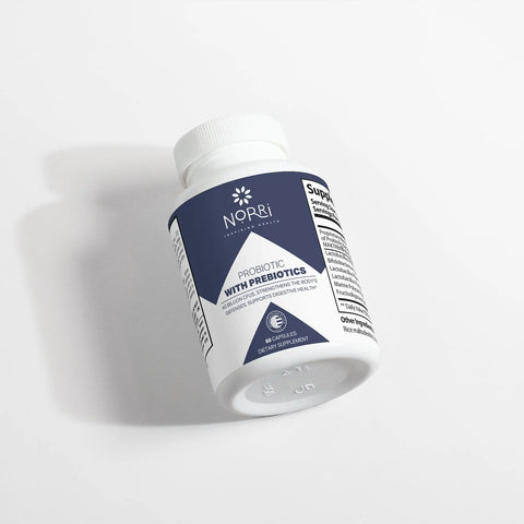 A white bottle of Norri Nutrition Probiotic 40 Billion CFUs With Prebiotics, containing 60 capsules for digestive health, rests on its side atop a white surface. The mainly blue label shows white text and a small leaf graphic.