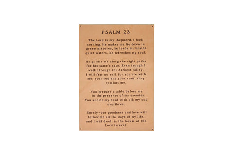 The Urban Southern Psalm 23 Leather Sign is a tan handcrafted art piece displaying Psalm 23 in black letters, describing God as our shepherd and promising comfort, guidance, and dwelling in the Lord’s house forever.