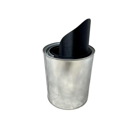 A silver Chatelet Manufacturing quart-sized paint can features the Quart Paint Pourer—No More Spills—black, curved, and partially inserted into the opening, set against a plain white background.