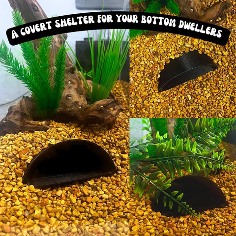 The REEFSHAPE Pocket Cave by Chatelet Manufacturing rests on yellow gravel with green plants and driftwood, offering a sleek black hideaway for your fish and other aquatic pets. Text above: A covert shelter for your bottom dwellers.