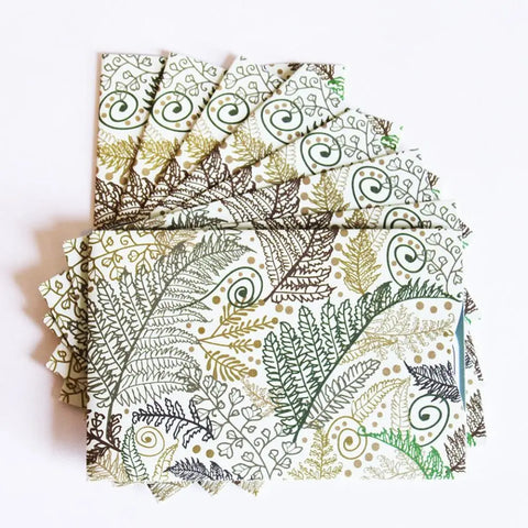 Protect your cards in style with Rogue Industries’ RFID Blocking Credit Card Sleeves - Fern, featuring a botanical pattern of green, brown, and gold leaves and ferns on white. Perfect for secure, fashionable identity theft prevention.