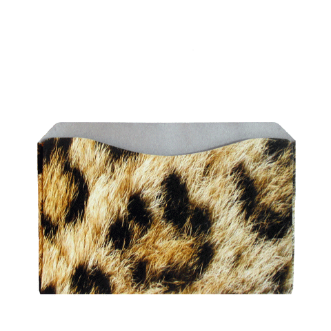 A set of RFID Blocking Credit Card/Passport Sleeves by Rogue Industries sits on a white background, offering stylish protection against identity theft much like a chic leopard print tissue box shields tissues.