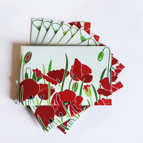 A set of Rogue Industries RFID Blocking Credit Card/Passport Sleeves, with a poppy and green stem design on white, fanned out like stylish note cards to protect against identity theft.