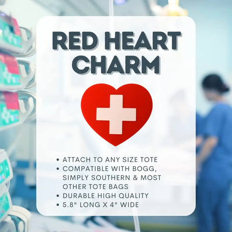 The Boglets RN Nurse Charm by Chatelet Manufacturing, featuring a red heart with a white cross, is shown on a clear box with a blurred hospital backdrop. It fits Bogg Bags and more, offers high durability, and measures 5.8 x 4 inches.